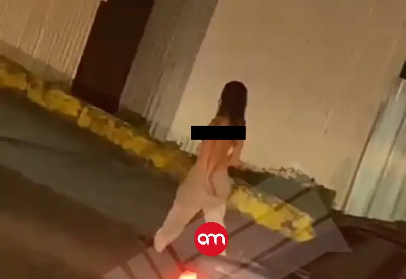 Mujer se desnuda sobre el techo de un camión en plena vía pública en Limón